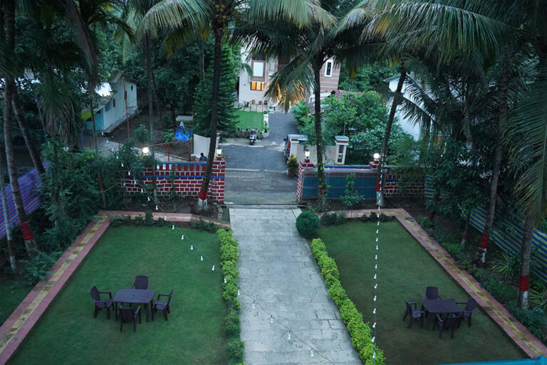 Megh Villa, Alibag: The front lawns and the path to the gate, seen from upstairs