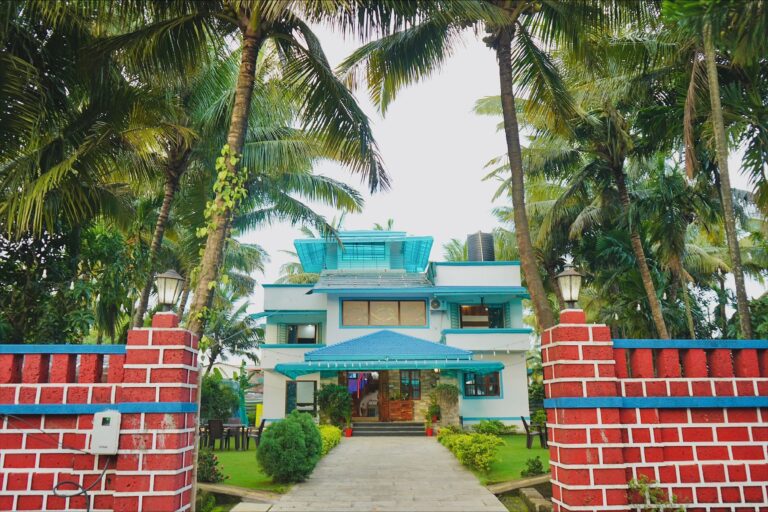 Megh Villa, Alibag: The villa through the red brick gate pillars