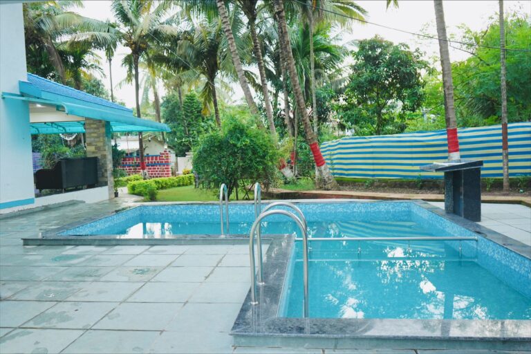 Megh Villa, Alibag: The pool beside the covered sit-out