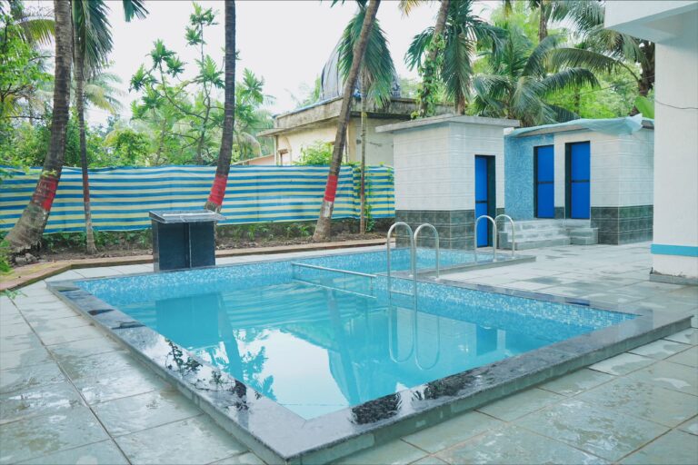 Megh Villa, Alibag: The pool and the poolside shower block