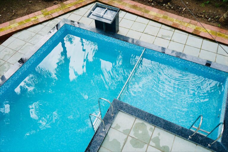 Megh Villa, Alibag: The pool from above, with steps at the near corner
