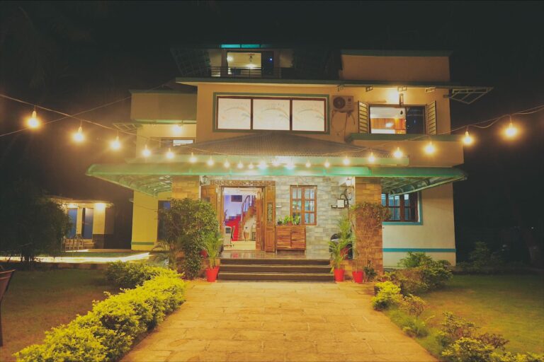 Megh Villa, Alibag: The front of the villa after dark, under the string lights